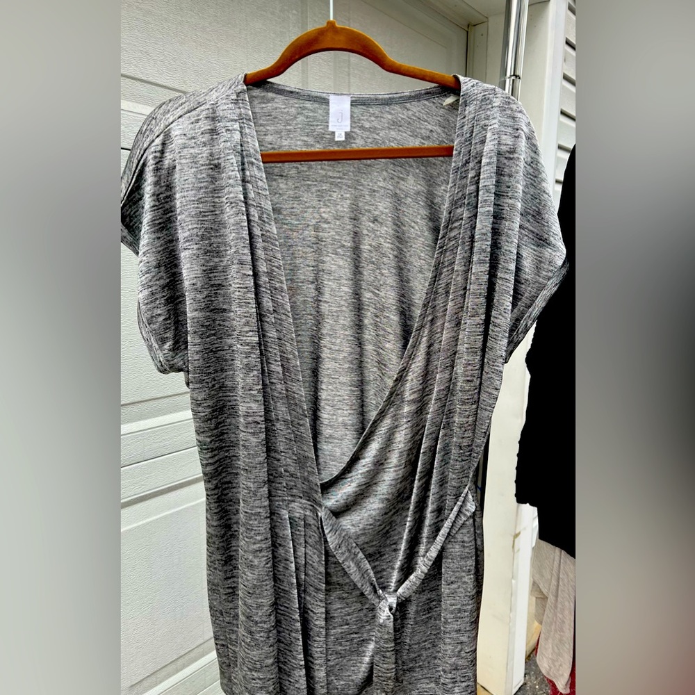 Woman’s short sleeve cross over top